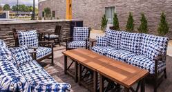 Table and Soft Seats at Outdoor Patio