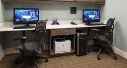 Business Center With Two Computers and a Printer
