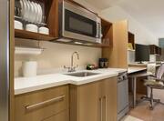 Kitchen Area in a Studio Suite with 2 Queen Beds