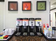 Close-Up of Coffee Machine Dispensers