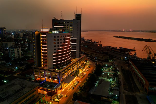 Aerial view at dusk of hotel exterior 