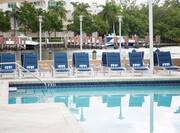 Daytime View of Blue Lounge Chairs by Heated Outdoor Pool