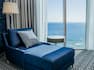 Lounger in room with sea view