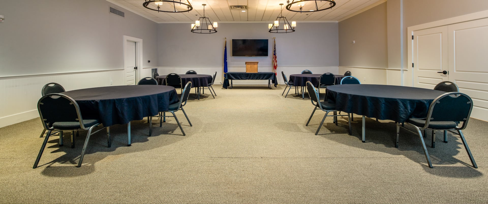 Community Room With Tables And Chairs