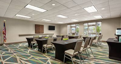 Meeting room with tables and chairs