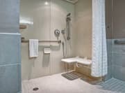 Accessible Guest Bathroom with Roll-In Shower 