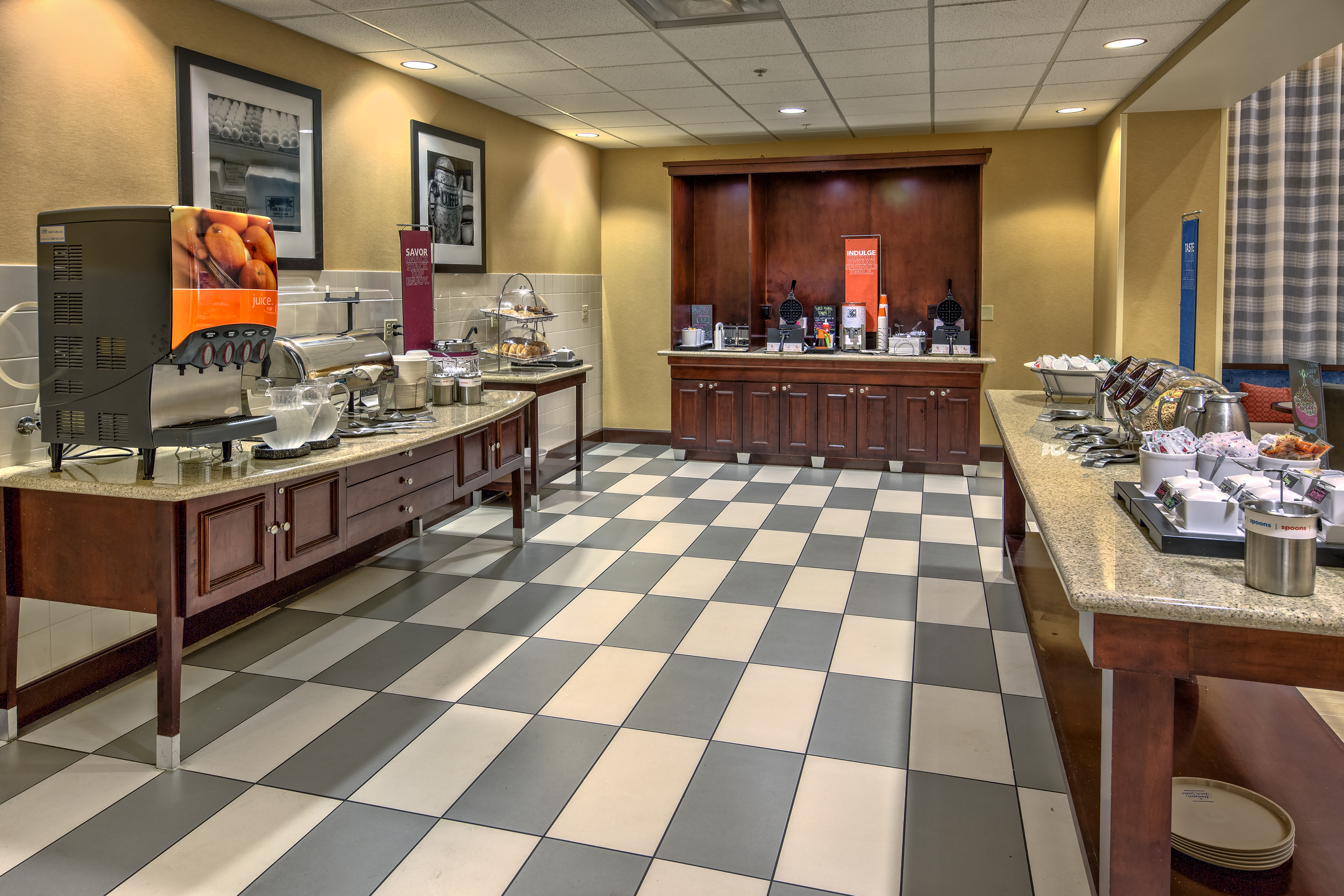 Breakfast Bar Area with Fresh Food and Drink Options 
