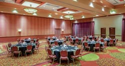 Chairs and Round Banquet Tables in Elderberry - Aspen Meeting Room