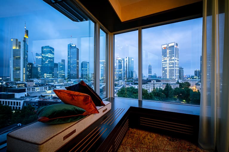 Large Windows in Suite with Panoramic Views of the City 