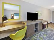 Room Amenities Work Desk, TV and Cube Block Seating under Table