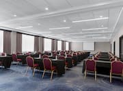 Meeting room with tables and chairs