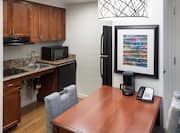 Accessible King Studio Suite Kitchen with dining table 