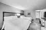 Two Queen Beds Guest Bedroom and HDTV