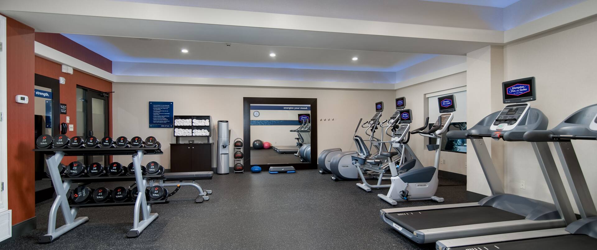 Fitness Center with Treadmills, Cycle Machines, Cross-Trainers and Dumbbell Rack