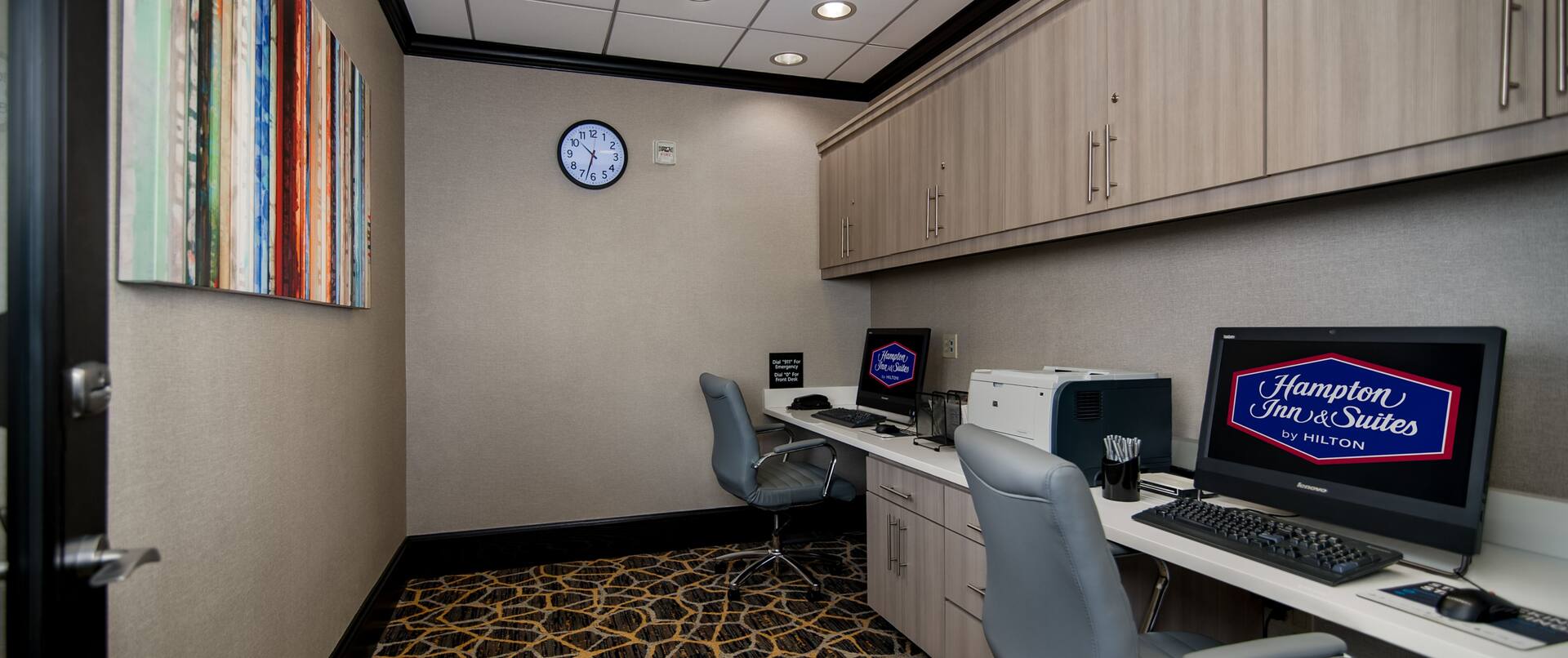 Business Center with Two Desktop Computers, Office Chairs and Printer