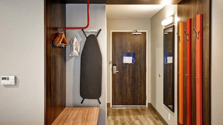 Guest Room Entrance with Wardrobe Hanging Area , Iron and Ironing Board