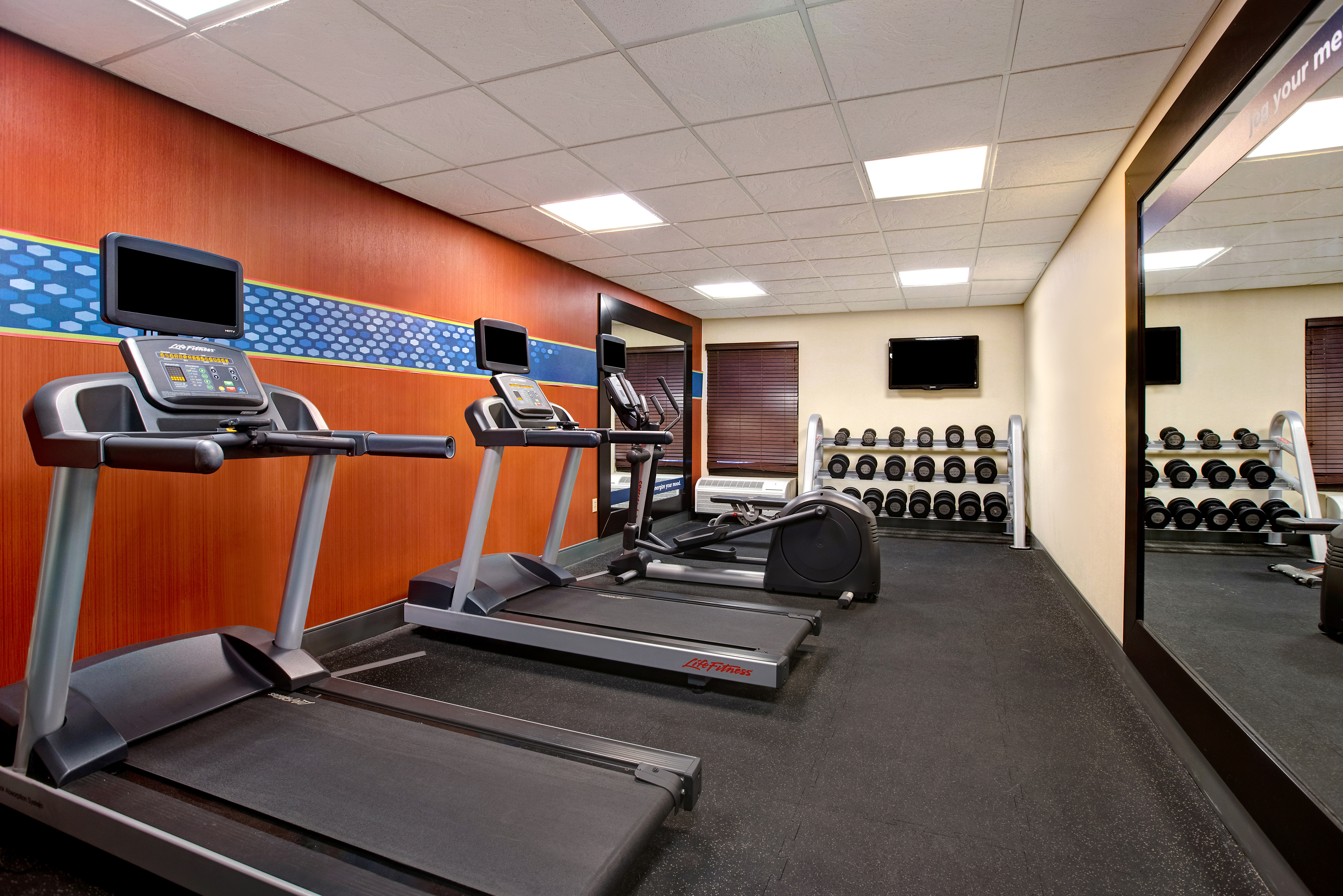On-Site Fitness Center, Treadmills, Free Weights