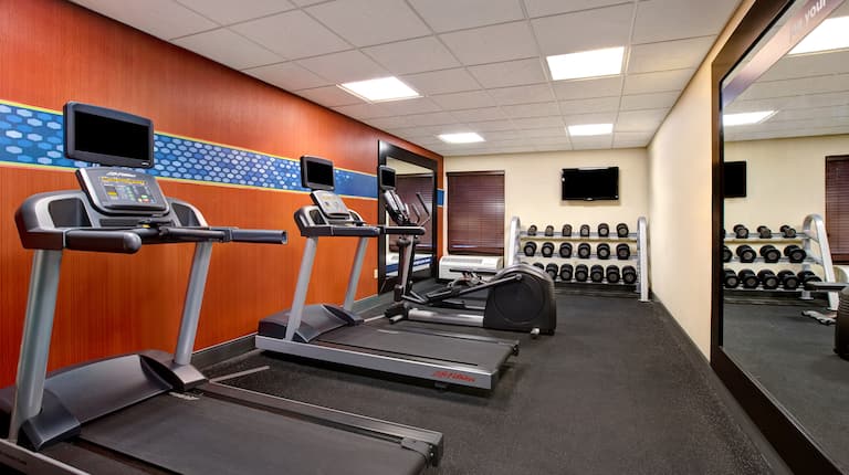 On-Site Fitness Center, Treadmills, Free Weights
