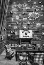 Seating area with road signs on wall