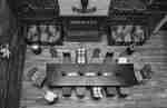 Overhead view of table in lobby with array of chairs