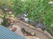 Balcony View of Outdoor Patio and River Bed