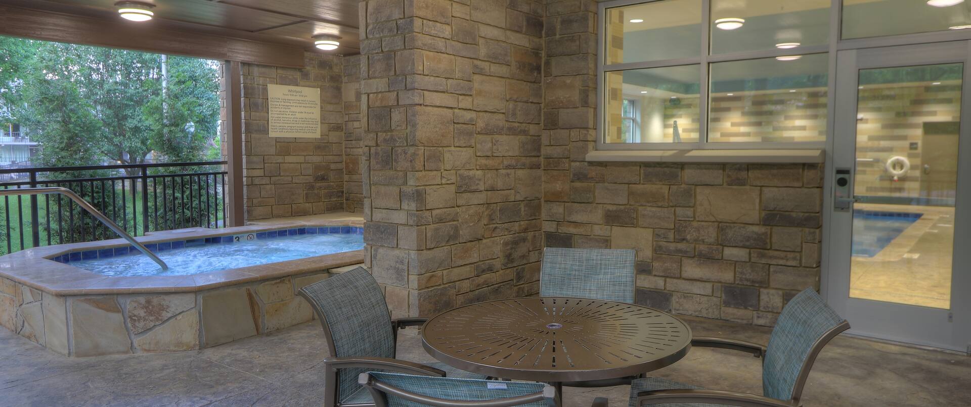 Outdoor Patio Seats and Table with Hot Tub