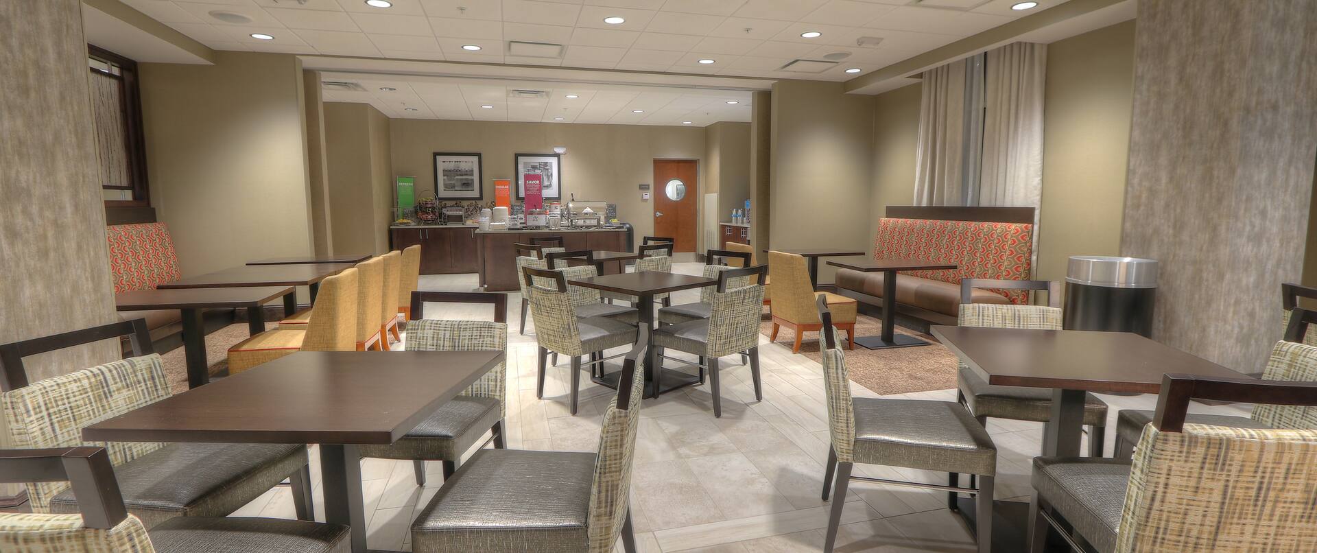Restaurant Dining Area with Chairs and Tables