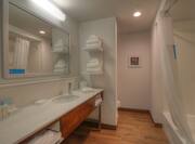 Guest Bathroom Mirror, Sink, Towel Shelf and Tub