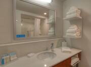 Guest Bathroom Mirror, Sink and Towel Shelf