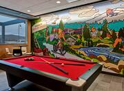 lobby pool table and mural
