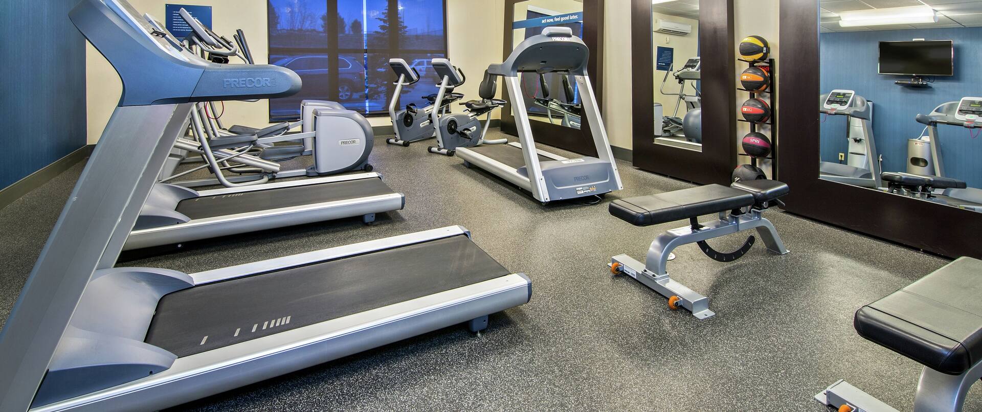 Fitness center with treadmills and recumbent bikes