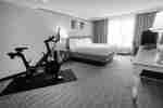 King Bedroom With Fitness Bike