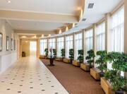Banquet Hallway with Plants and Windows