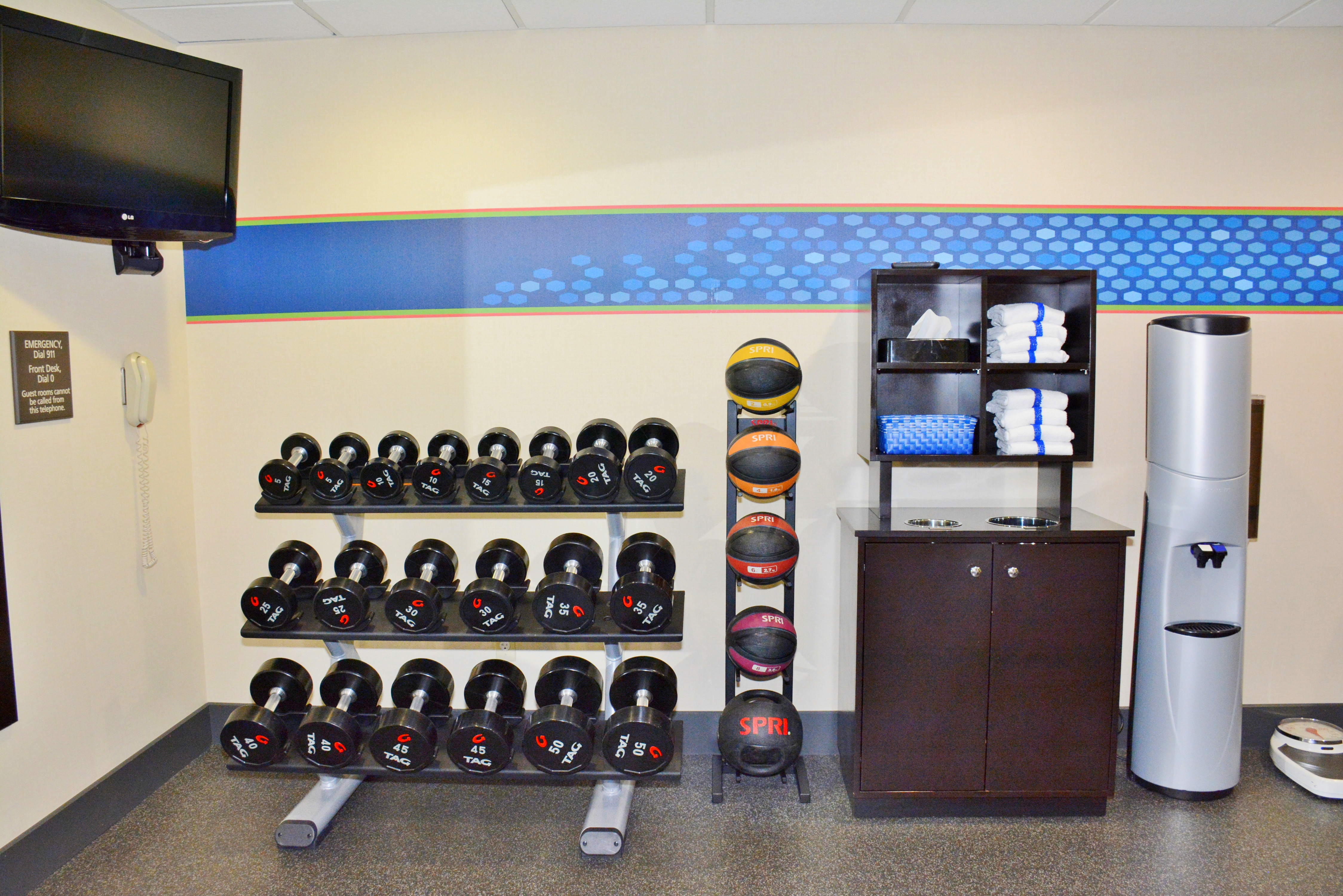 Fitness Center Weights, Towels and Water Dispenser