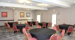 1,064 sq. ft. Grand Room Meeting Space with Round Table Setup