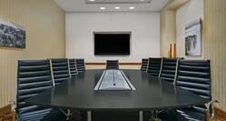 Boardroom with Seating for 10 Guests and an HDTV
