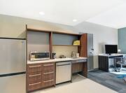 Accessible Suite Kitchen with Stainless Steel Appliances