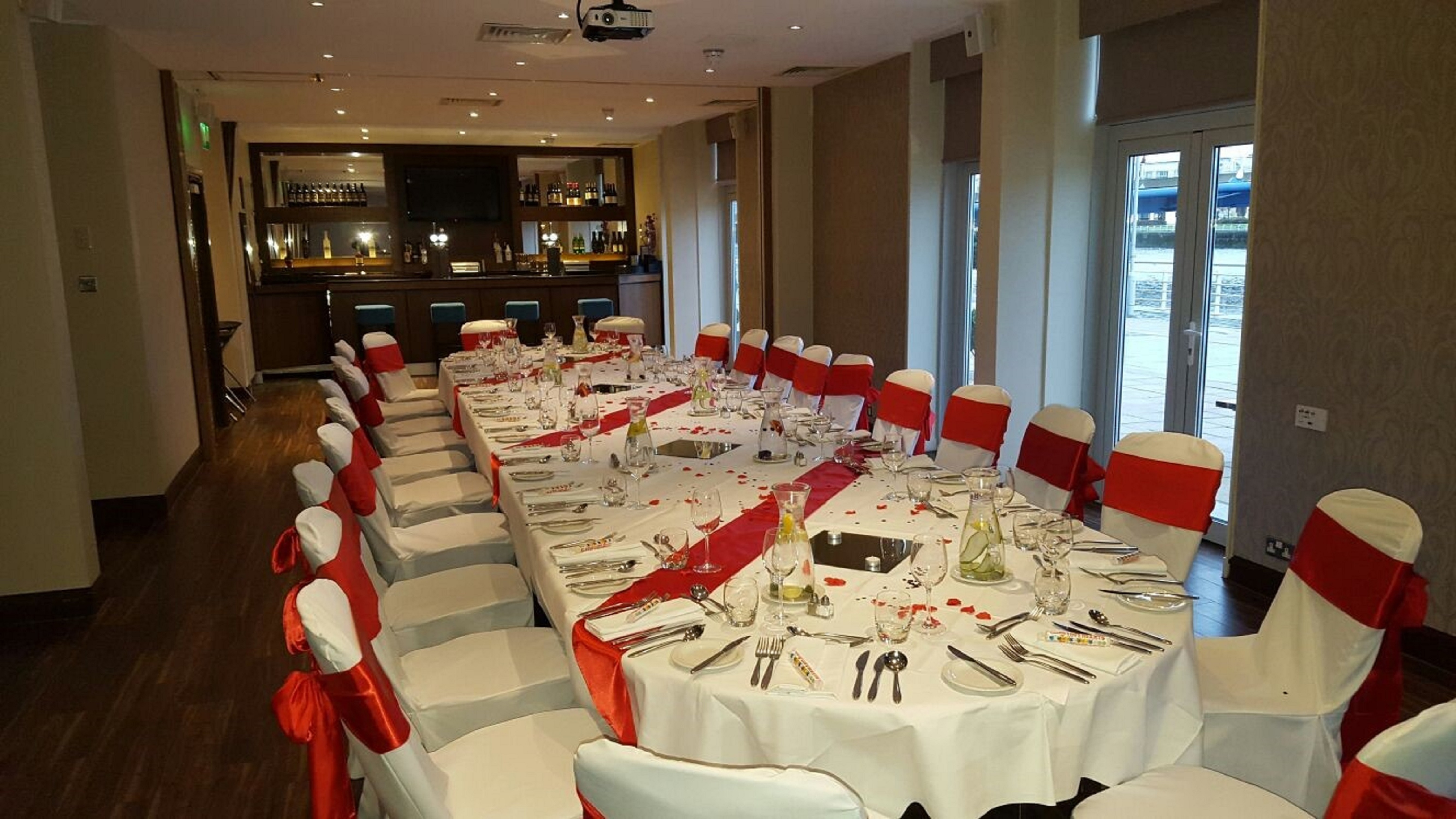 Private Party Dinner Table with Red Sash Decor