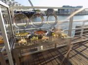 BBQ Buffet on Outdoor Deck with View of Water
