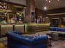 Cask and Clyde Bar with Comfortable Blue Sofas and Tables