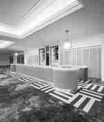 Área de recepción previa con encimera e iluminación