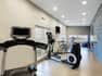 Fitness Center with Treadmill Weights and TV