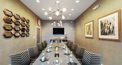Boardroom with TV and Seating for 12 Guests