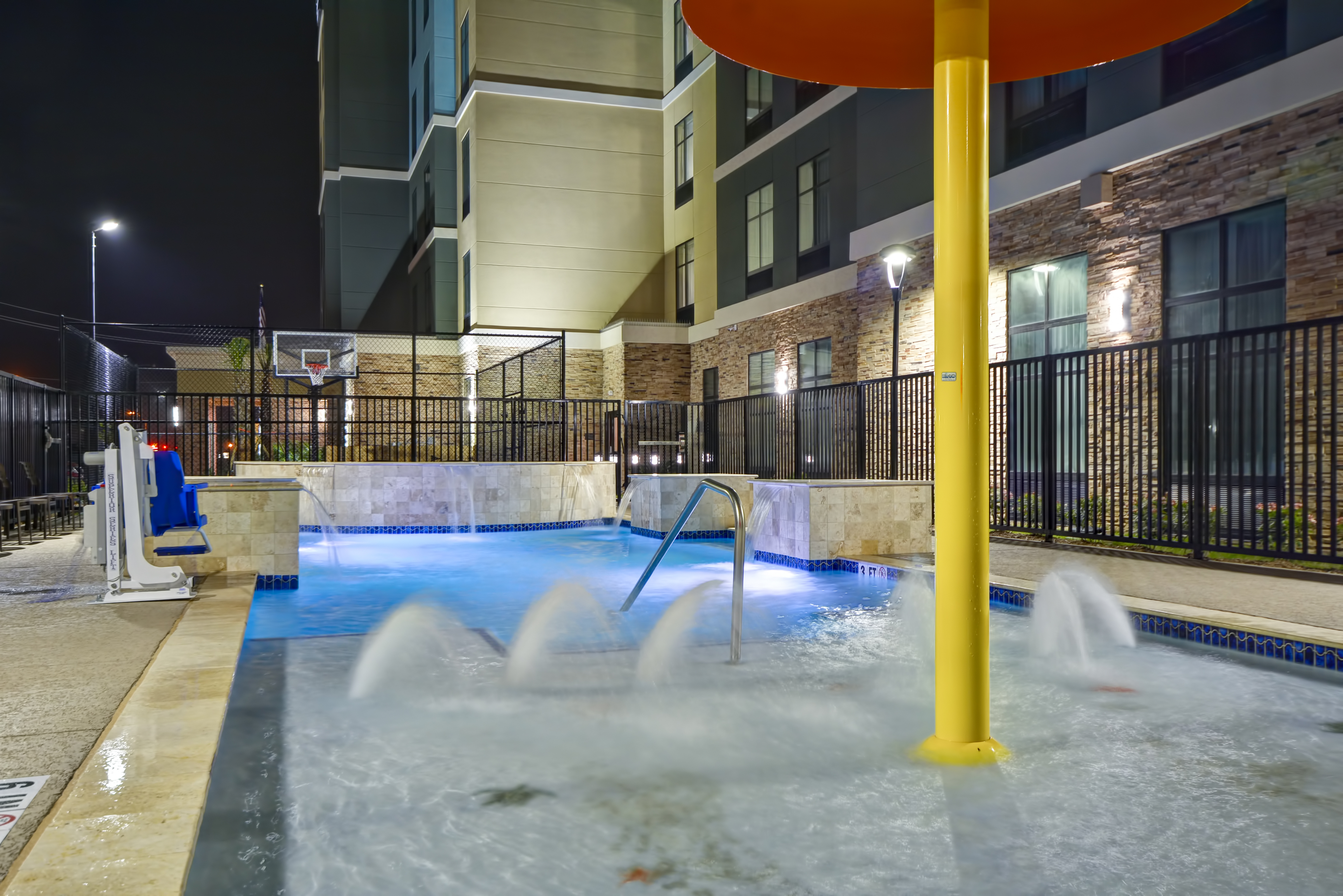 Outdoor Pool Kids Splash Area at Night