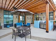 Outdoor Covered Patio with Tables and Chairs