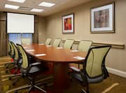 Boardroom meeting space table and chairs