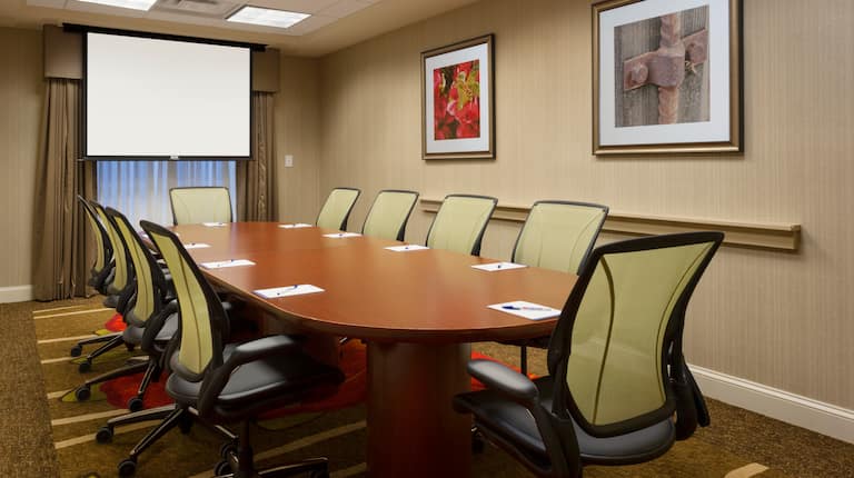Boardroom meeting space table and chairs