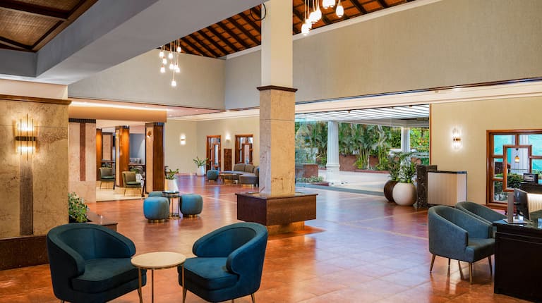 Lobby lounge area with couch and TV