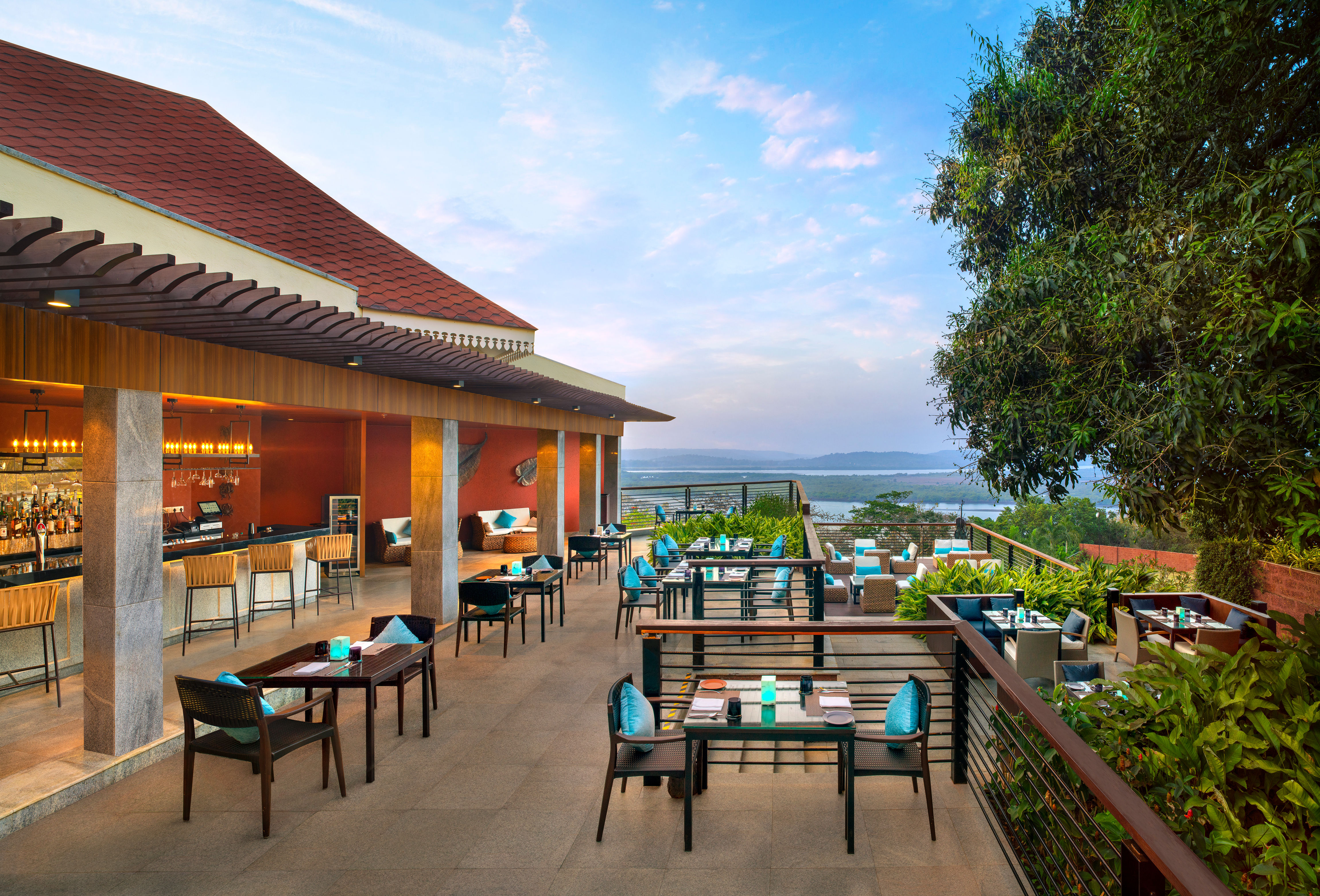 Feliz restaurant patio tables and scenic views. 