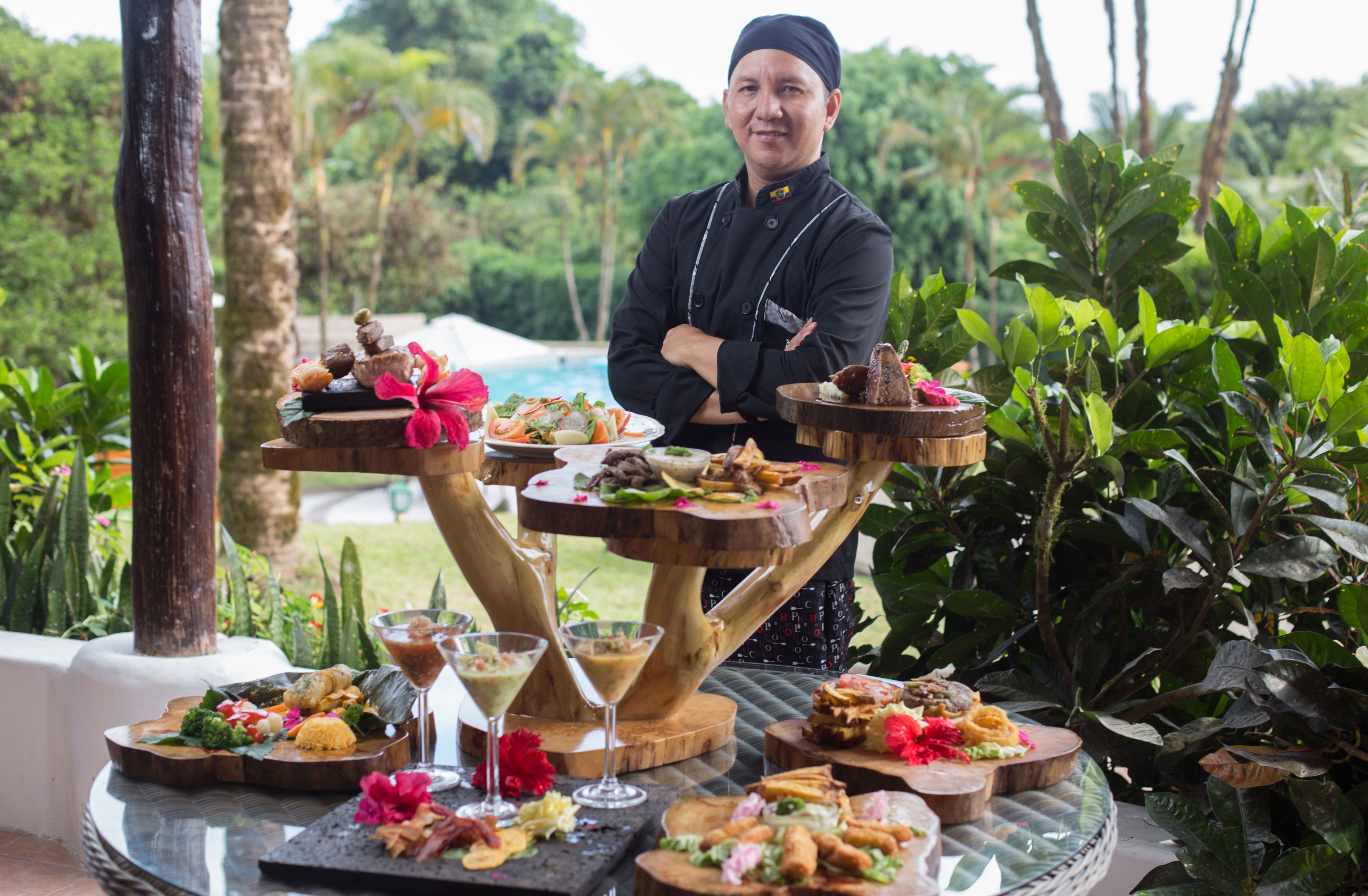 Chef with food and drinks display